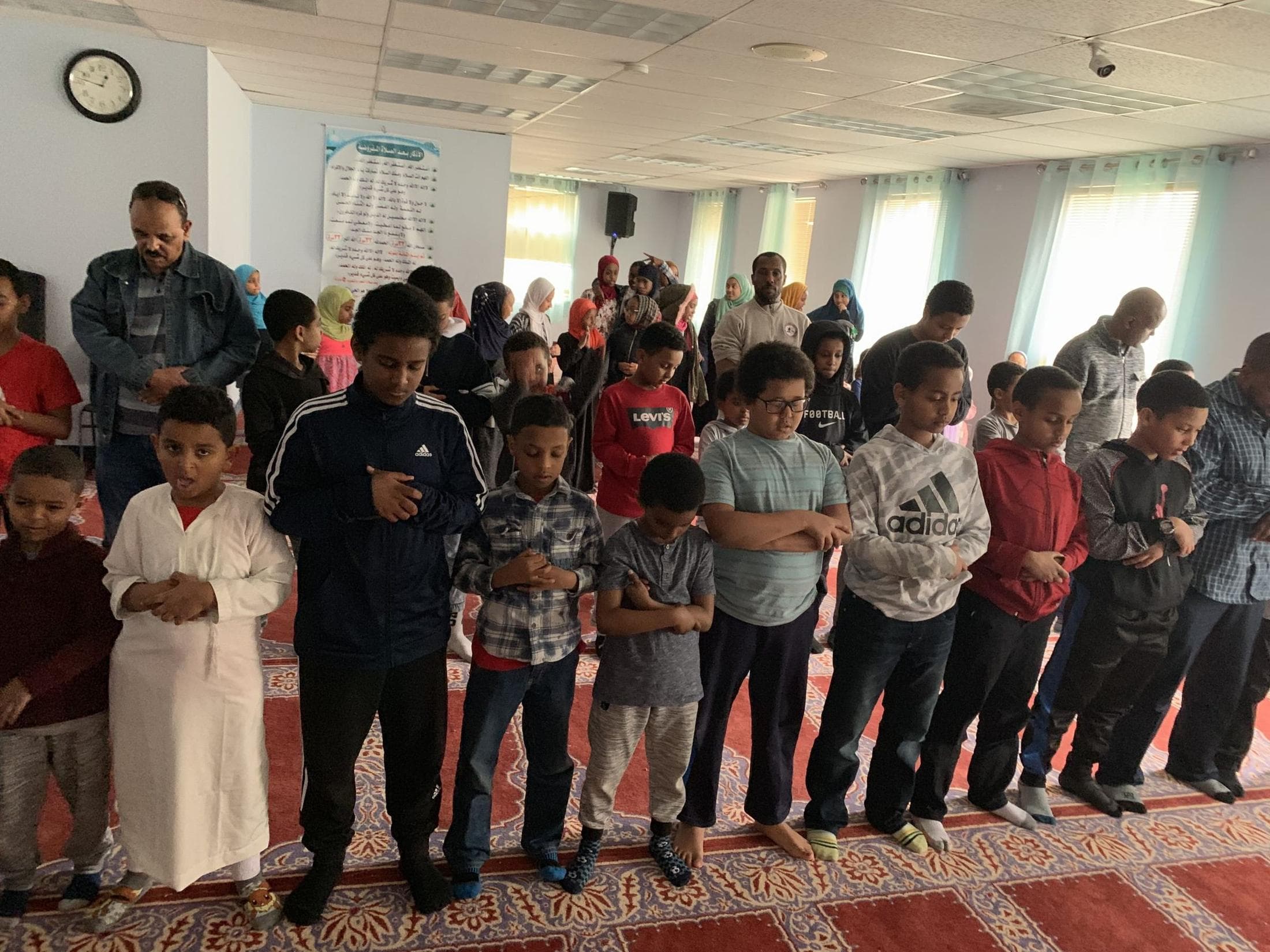 Youth gathered in prayer at a Selam Foundation program